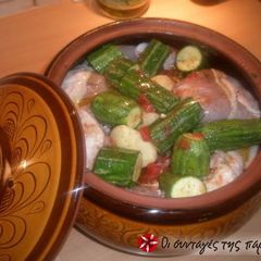 A picture of Chicken with vegetables in a casserole dish.