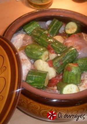A picture of Chicken with vegetables in a casserole dish.