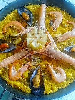Una foto de Paella