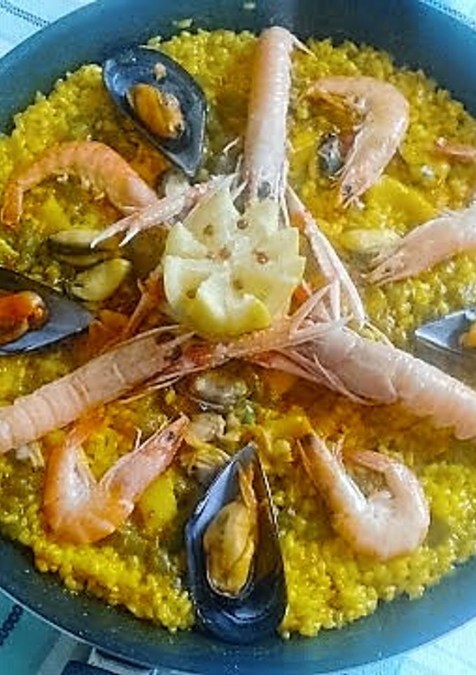 Una foto de Paella