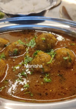 A picture of Maharashtrian Golyachi Aamti (गोळ्याची आमटी).