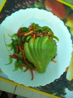 A picture of Avocado fern assorted veg Carrie salad.