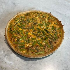 A picture of Asparagus and feta quiche.