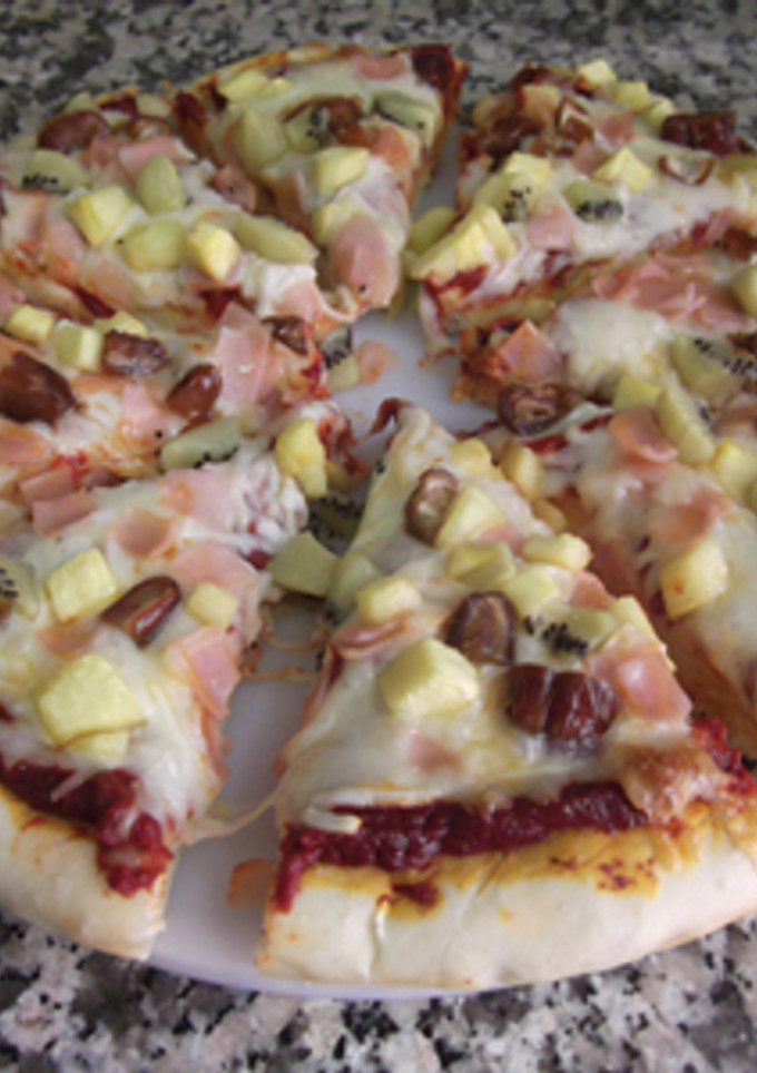 Una foto de Pizza hawaiana