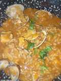 Meloso de sepia, langostinos y almejas