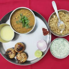 A picture of Dal bati churma.