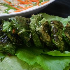 Stuffed Mustard Leaves Parcels A picture of Stuffed Mustard Leaves Parcels.