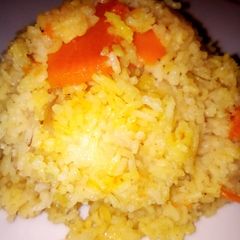 A picture of Turmeric rice with carrots and butternut.