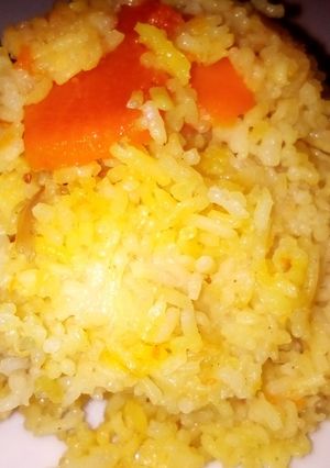 A picture of Turmeric rice with carrots and butternut.