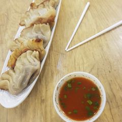A picture of Meat and cabbage potstickers.
