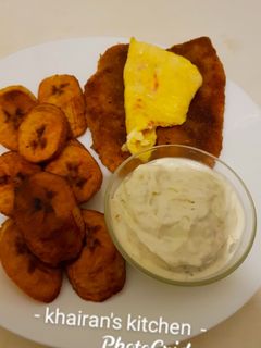 Plantain, egg, and fillet fish ainihin hoton girkin
