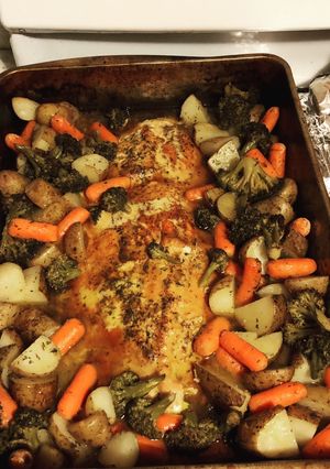 A picture of Garlic Buttered Salmon with Potatoes, Carrots, Broccoli !.