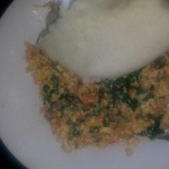 Fried eggs with ugali A picture of Fried eggs with ugali.