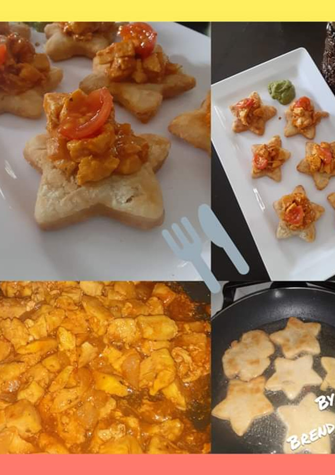 Una foto de Arepas con pollo guisado