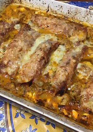 Une photo de Endives gratinées jambon champignons tomate emmental et feta
