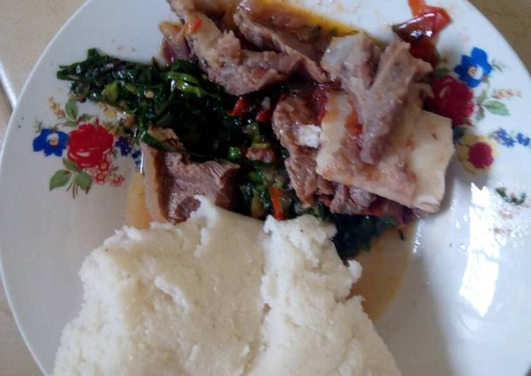 Beef stew with greens and ugali
