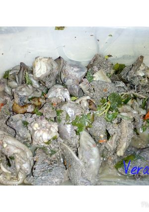 A picture of Assorted Goat meat pepper soup.