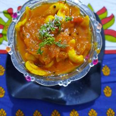 A picture of Tomato kaju curry.