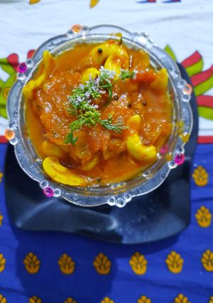 A picture of Tomato kaju curry.