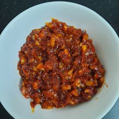 A picture of Schezwan sauce/ chutney.