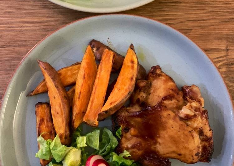 How to Prepare Quick Sticky bbq chicken thighs served with sweet potato chips and a crisp lemon salad