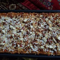 A picture of Homemade 1/2 meter pizza.