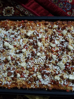 A picture of Homemade 1/2 meter pizza.