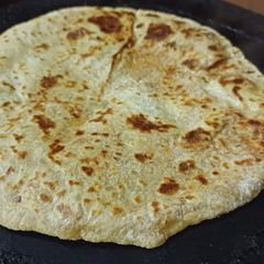 A picture of Sweet potato stuffed poli.