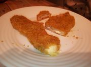 Una foto de libritos de lomo y queso