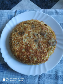 Una foto de Tortilla de champiñones y carne picada