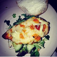Tomato pesto with cheese & salad chicken burger A picture of Tomato pesto with cheese & salad chicken burger.