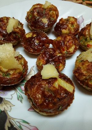 A picture of Omelete mixture baked in cases.