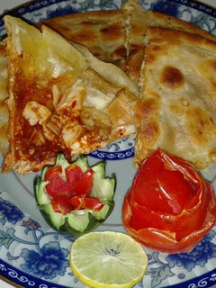 A picture of Frozen Paratha Filled With Chicken and Cheese.