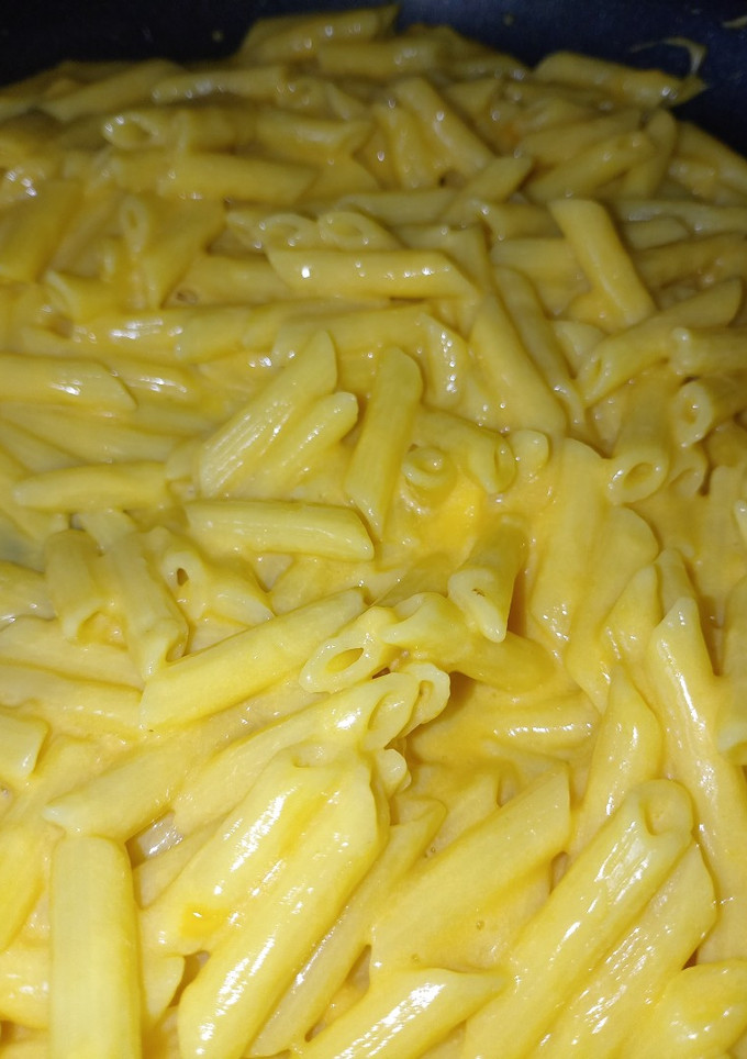 Una foto de Plumitas en salsa de queso