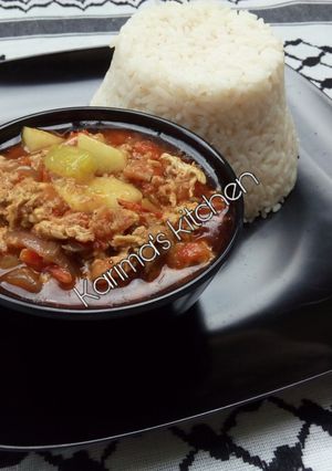 A picture of White rice/egg stew.