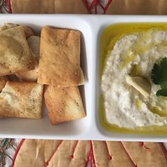 Baba Ganoush with pita chips A picture of Baba Ganoush with pita chips.