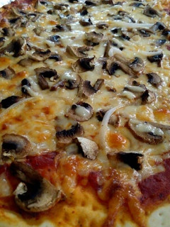 Una foto de Pizza
