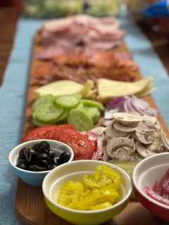 A picture of Subway at home/ sub board.