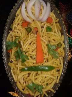 A picture of Yellow Masala Noodles.