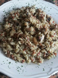Una foto de Risotto de champiñones con jamón