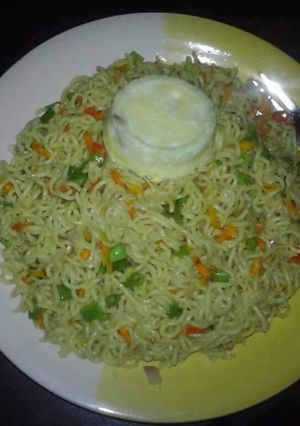 A picture of Indomine with vegetables and egg.