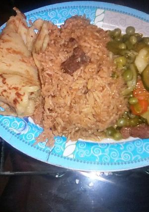 A picture of Pilau,peas and pancake.