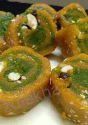 A picture of Split chickpea pistachio mawa sweet rolls.