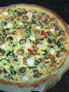 Una foto de Quiche vegetal con espinaca y champiñones