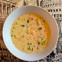 A picture of Cheesy Rice And Broccoli Soup.