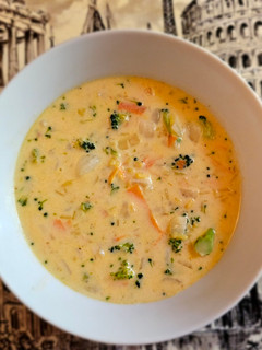 A picture of Cheesy Rice And Broccoli Soup.