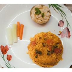 Tomato Rice with Boondi Raita A picture of Tomato Rice with Boondi Raita.