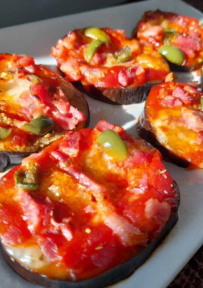 Una foto de Berenjenas tipo Pizza Margarita🍆🍕