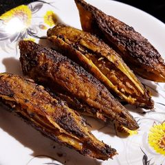 A picture of Stuffed karela/bittergourd.