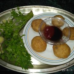 A picture of Aaloo pyaaz ki kachori.